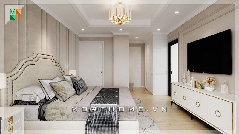 Mẫu kệ tivi tân cổ điển màu trắng sữa có thể hài hòa với nội thất trong phòng ngủ, giúp tăng cường sự tiện nghi của phòng ngủ.